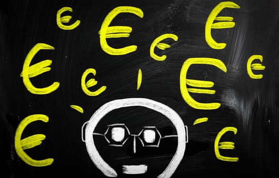 "Euro" handwritten with white chalk on a blackboard
