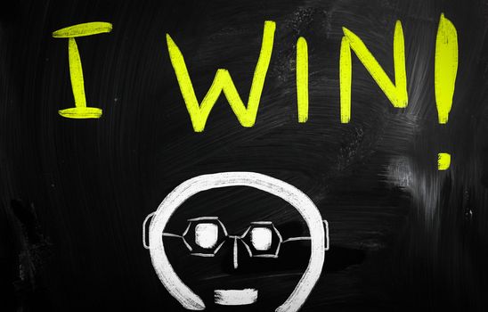 "Win" handwritten with white chalk on a blackboard