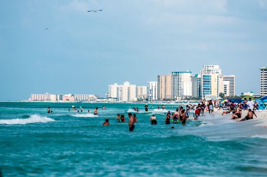 public beach in florida with many people