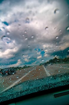 driving on highway in rainy weather