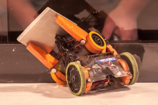 mini robot wars indoors by a human controllers