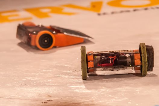 mini robot wars indoors by a human controllers