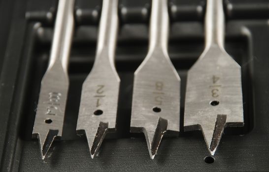 stock pictures of a set of drill bits used to make holes