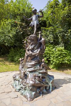 The famous Peter Pan statue in Kensington Gardens, London.
