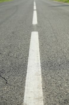 Arrow signs as road markings on suburban driveway