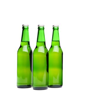 Three beer bottles. Isolated on white background