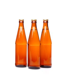 Three beer bottles. Isolated on white background
