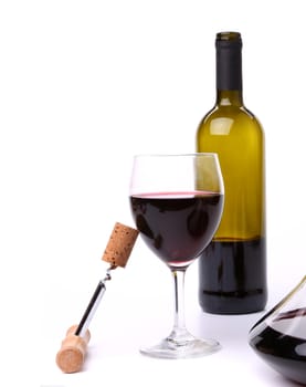 decanter, bottle and glass with red wine