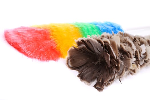 Two different dusters. Close up. White background.