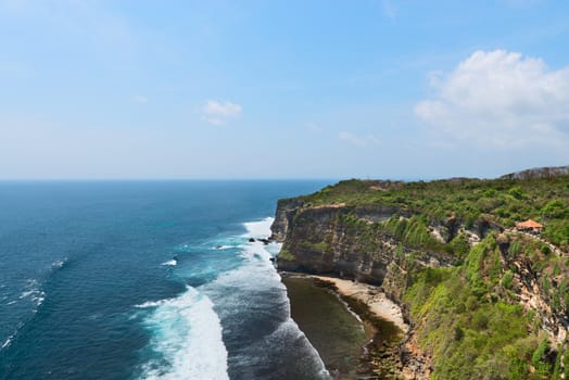 Cliffs above blue tropical sea on Nusa Dua, Bali, Indonesia