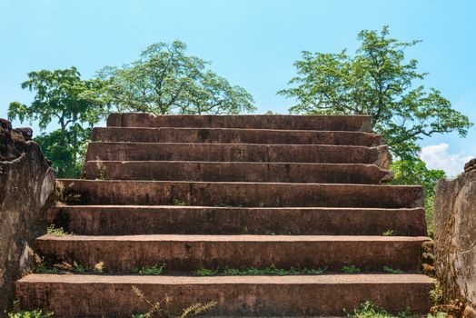 Ancient stone stairs to  blue sky at day 