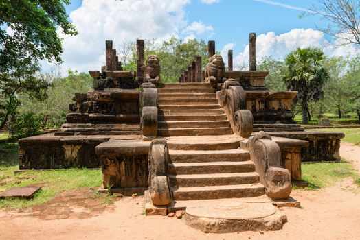 Audience Hall with steps and lion carvings part of the ruins of the ancient kingdom capital in Polonnaruwa, Sri Lanka 