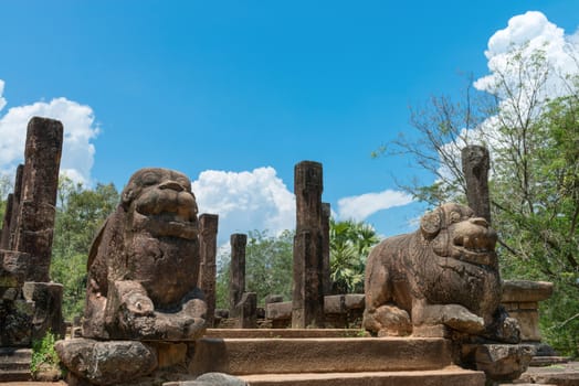 Audience Hall with steps and lion carvings part of the ruins of the ancient kingdom capital in Polonnaruwa, Sri Lanka 