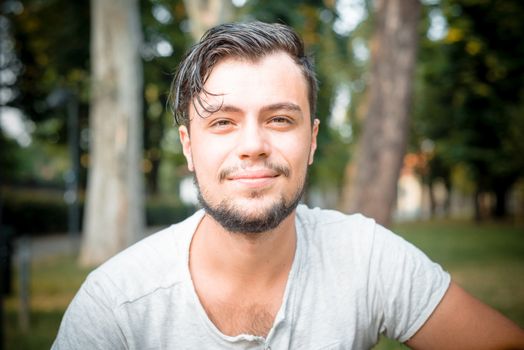 close up portrait of youg stylish man smiling