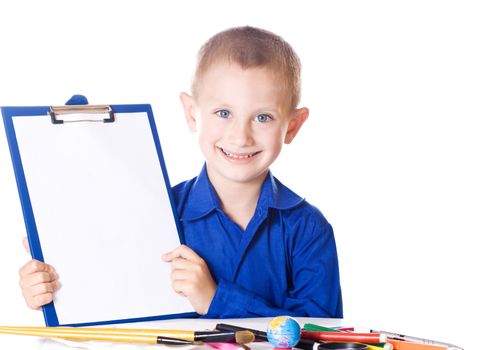 Schoolboy showing a blank sheet of paper