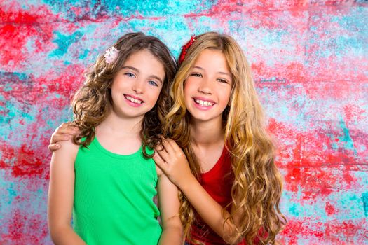 friends beautiful children girls hug together happy smiling on grunge background