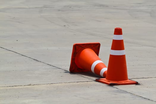 Background with traffic cone on road track