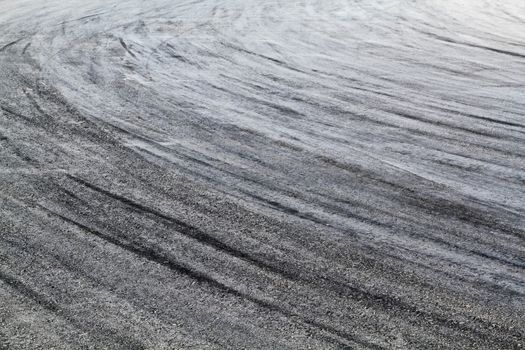 Background with tire marks on road track