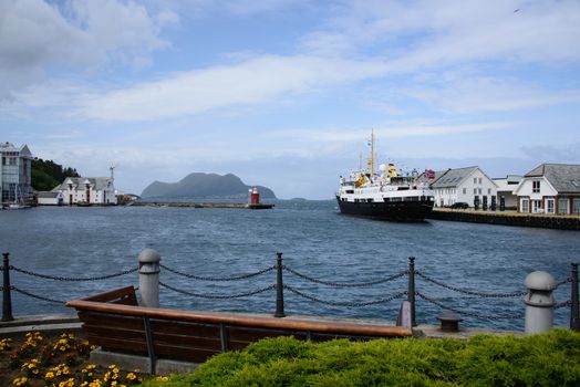 The view for a pier over Ålesund harbor in summer