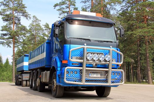 TAMMISAARI, FINLAND - JUNE 30, 2013: Sisu 18E630 truck in gravel transport in Tammisaari, Finland on June 30, 13. The Finnish heavy-duty trucks manufacturer Sisu Auto Oy has sold its whole production capacity for spring 2013 and hires more staff. 