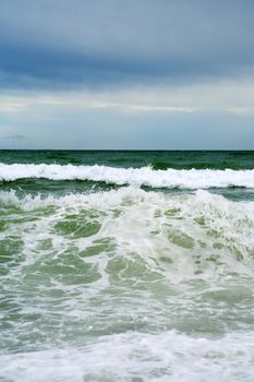 Lanscape with stormy sea and gloomy sky