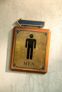 Bathroom Male symbols on wall