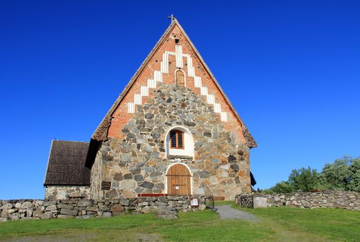 The St Olafs Church in Tyrvaa, Finland is a late medieval stone church in natural setting. It was built probably in 1510-1516.