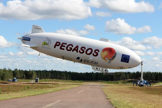 JAMIJARVI, FINLAND - JUNE 15, 2013: Pegasos Zeppelin NT airship attached to mast in Jamijarvi, Finland on June 15, 2013 after completing the ca. 30 research flights as part of the European PEGASOS project.