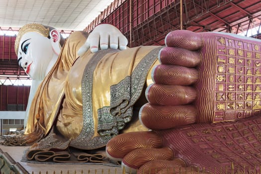 footprint of giant reclining Buddha at Chaukhtatgyi temple in Yangon, Myanmar