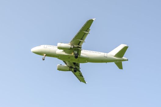 Airplane on a clear blue sky.