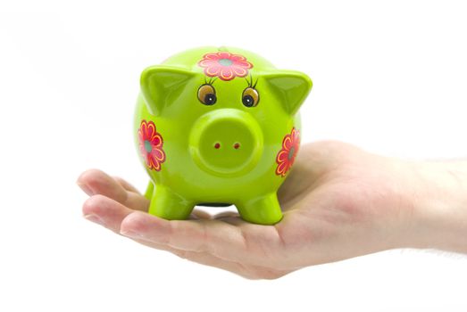 Man hands holding  a cute piggy bank