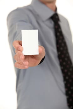 Man with a tie showing a blank card