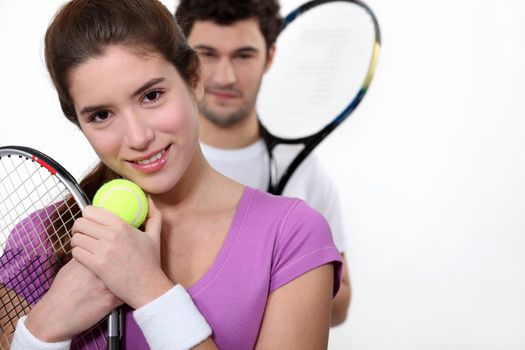 Couple dressed for tennis