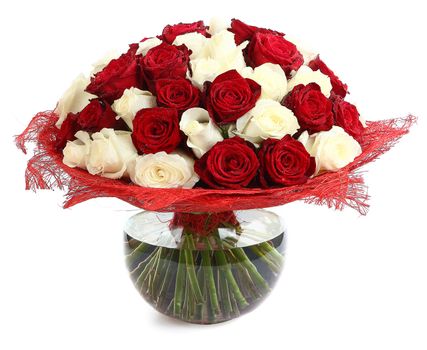 Floristic arrangement of white and red roses. Floral compositions of red and white roses. The isolated image on a white background. Roses in a Glass Vase