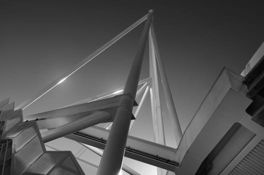 Metal construction of the pipes, black-and-white photo.