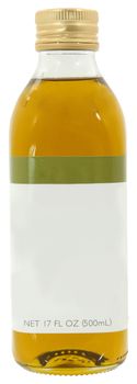 Store bought blank label olive oil in glass bottle over white.