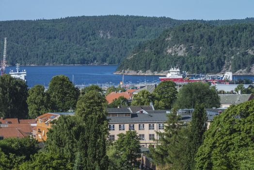 The picture is shot from Fredriksten fortress in Halden, Norway and shows some of Halden city and Halden harbor.
