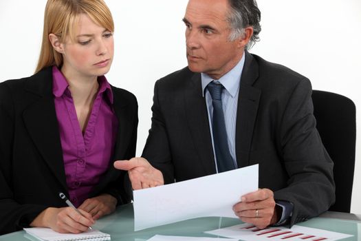 Business partners going over paperwork