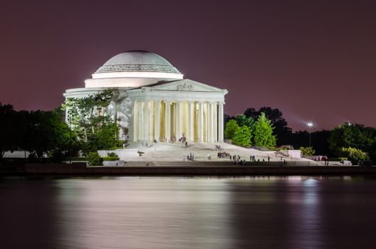 Scenic night view of the Jefferson Memorial in Washington DC reflecting in the Tidal Basin