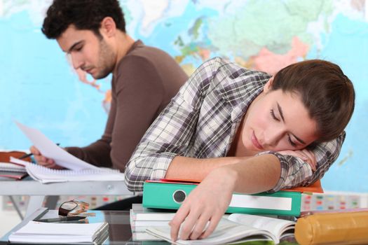 Student sleeping on her desk