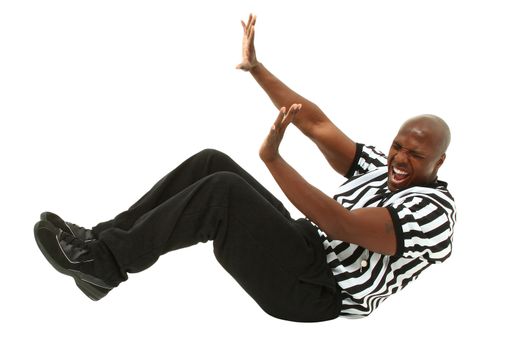 Fallen Black Male Referee in Uniform in Studio