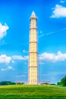 Outdoor view of Washington Monument in Washington DC with beautiful blue sky in background
