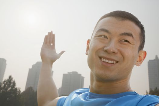 Young Muscular Man Stretching