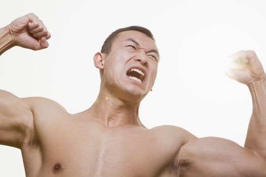 Roaring Man Flexing Muscles