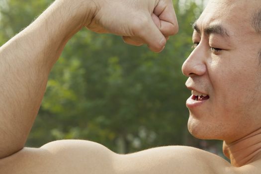Man Flexing Muscles