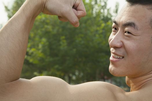 Man Flexing Muscles
