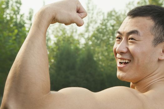 Man Flexing Muscles