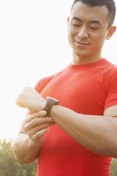 Muscular Man Checking His Watch