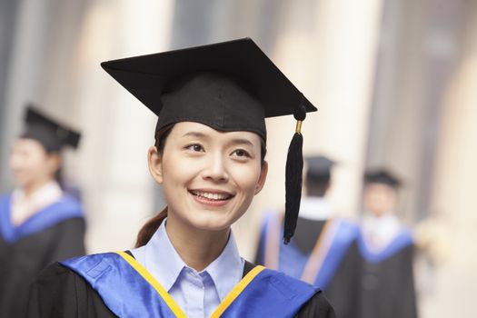 Young Female Graduate Smiling