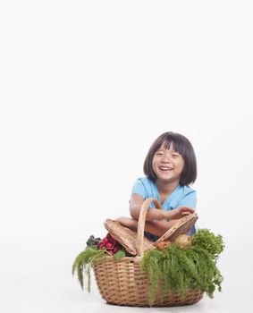 Child with Basket of Vegetables